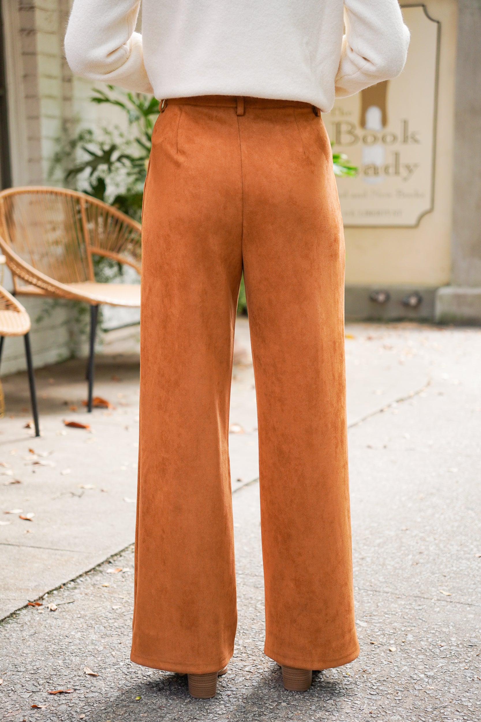 Camel colored vegan suede straight leg pants with pintuck detail, belt loops, side pockets