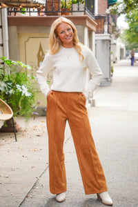 Camel colored vegan suede straight leg pants with pintuck detail, belt loops, side pockets