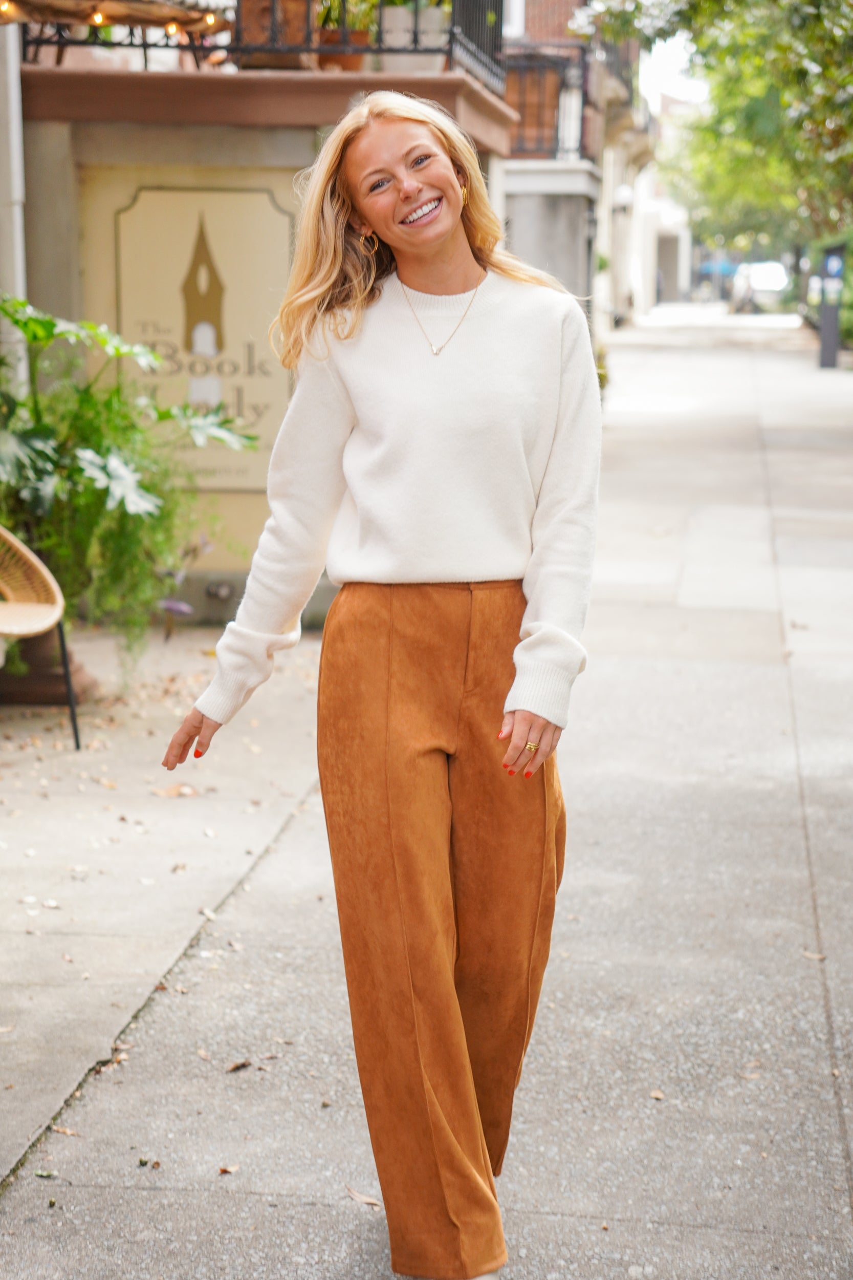 Camel colored vegan suede straight leg pants with pintuck detail, belt loops, side pockets