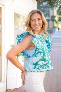 Embroidered light blue top
