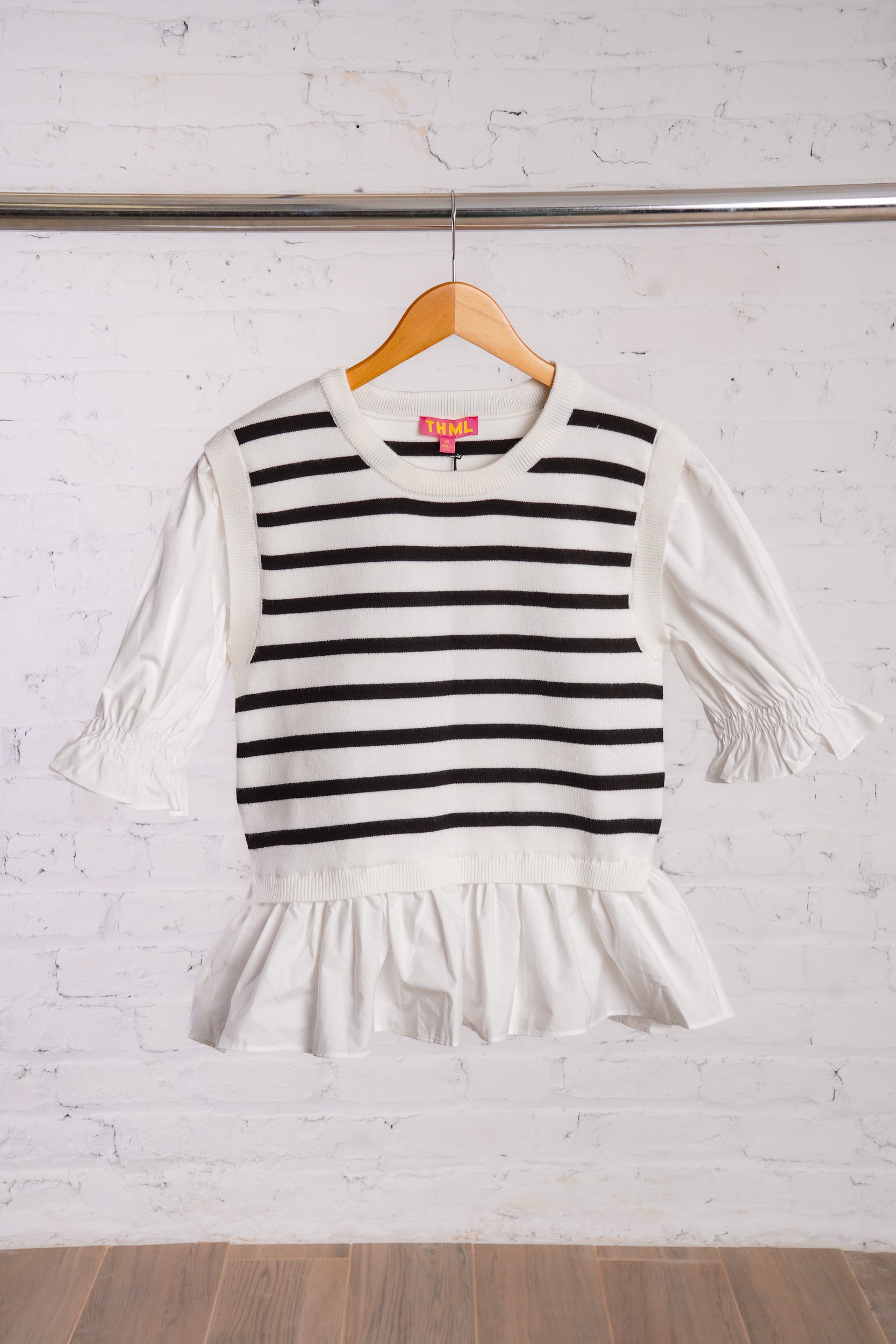 Black and white striped top with ruffled bottom