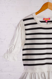 Black and white striped top with ruffled bottom