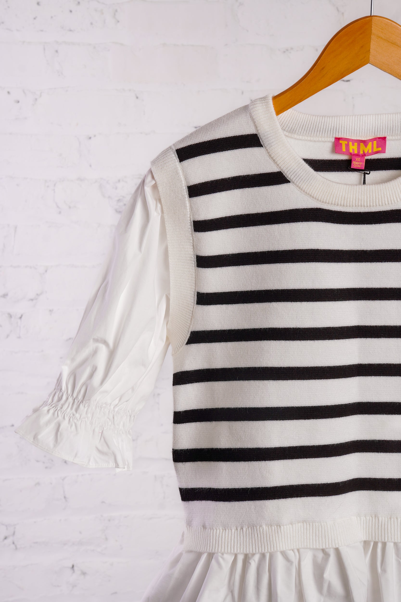 Black and white striped top with ruffled bottom