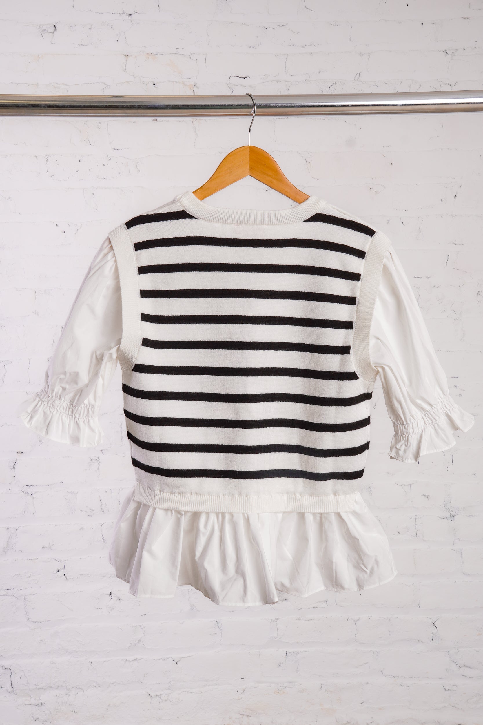 Black and white striped top with ruffled bottom