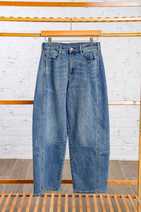 Barrel style blue jeans