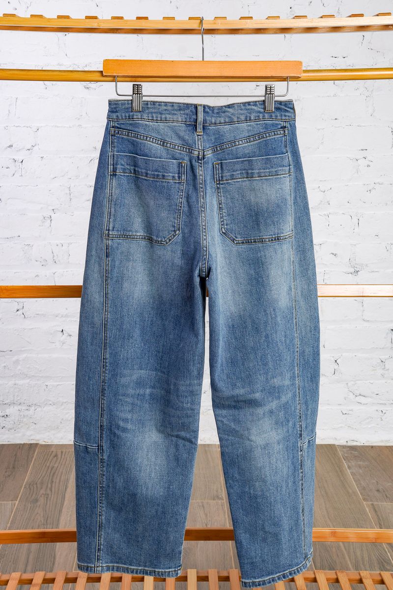 Barrel style blue jeans