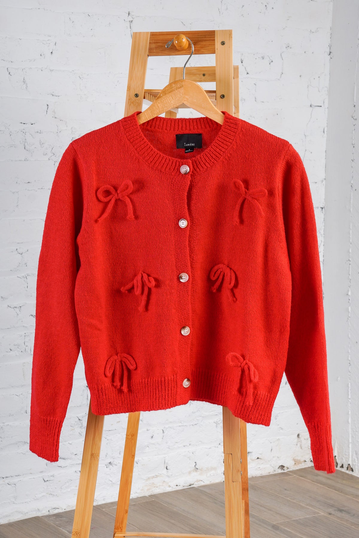 red bow sweater