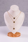 gold chain necklace with black accent 