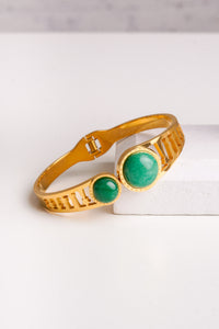 green and gold bracelet 