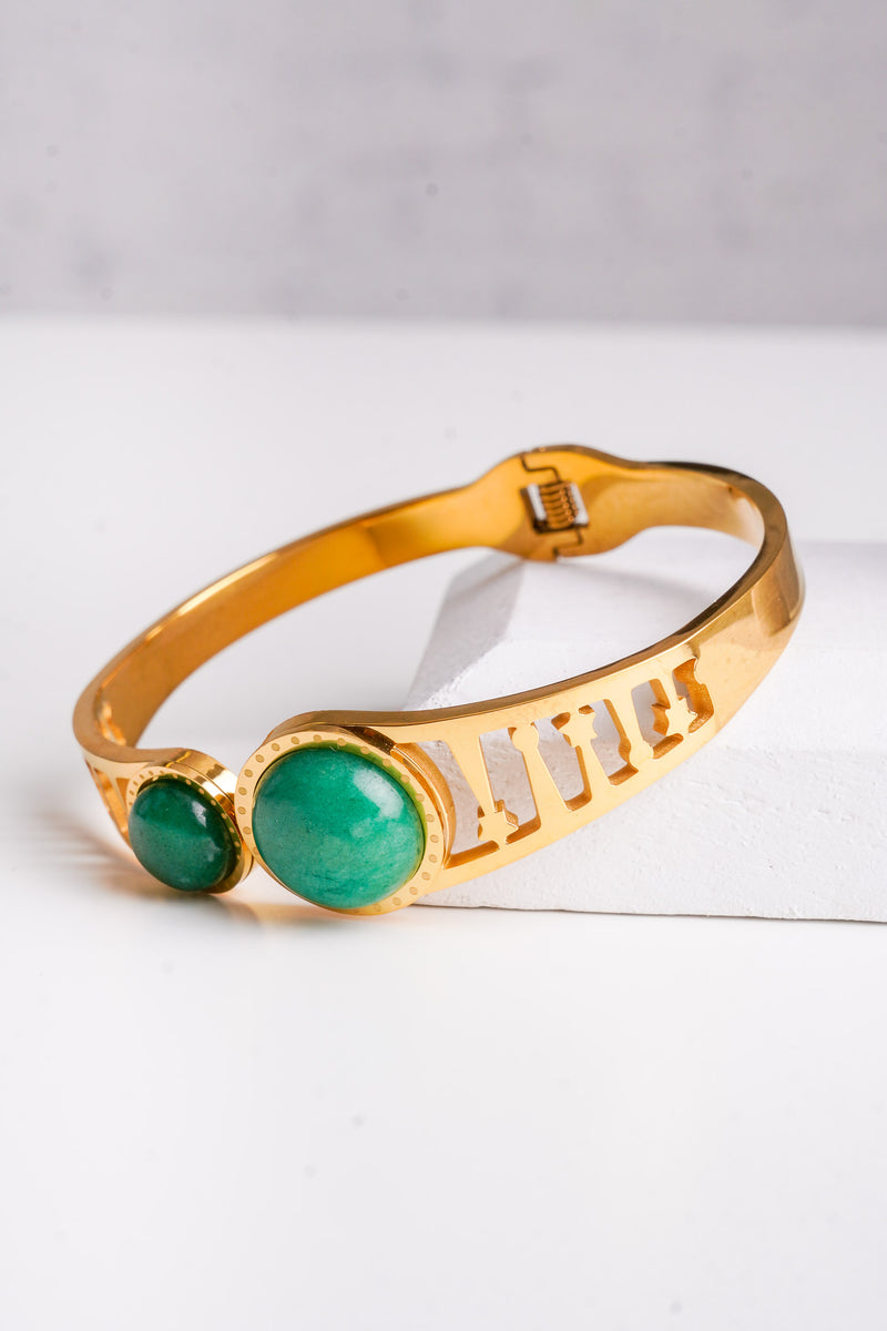 green and gold bracelet 