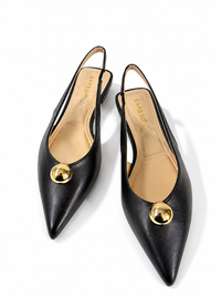 A pair of black pointed-toe slingback flats with gold-tone round studs on the toe, shown on a clean white background. The insoles display the brand name 'PANDORA'.