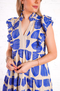 blue and tan patterned midi dress 