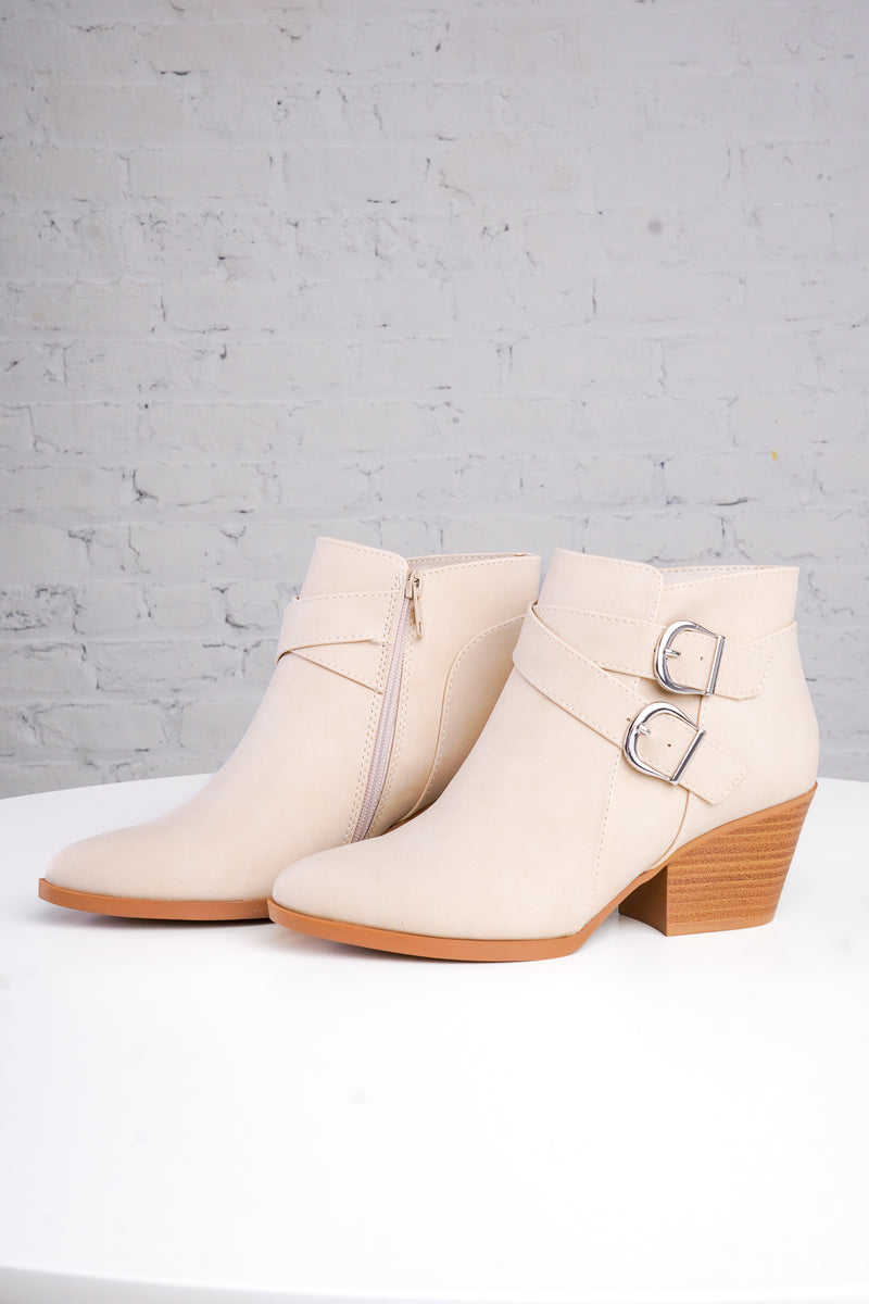 beige ankle boots with wooden soles with two buckles 