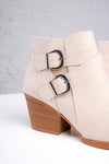 beige ankle boots with wooden soles with two buckles 
