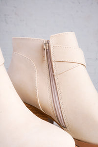 beige ankle boots with wooden soles with two buckles with side zipper 