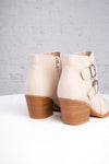 beige ankle boots with wooden soles with two buckles 