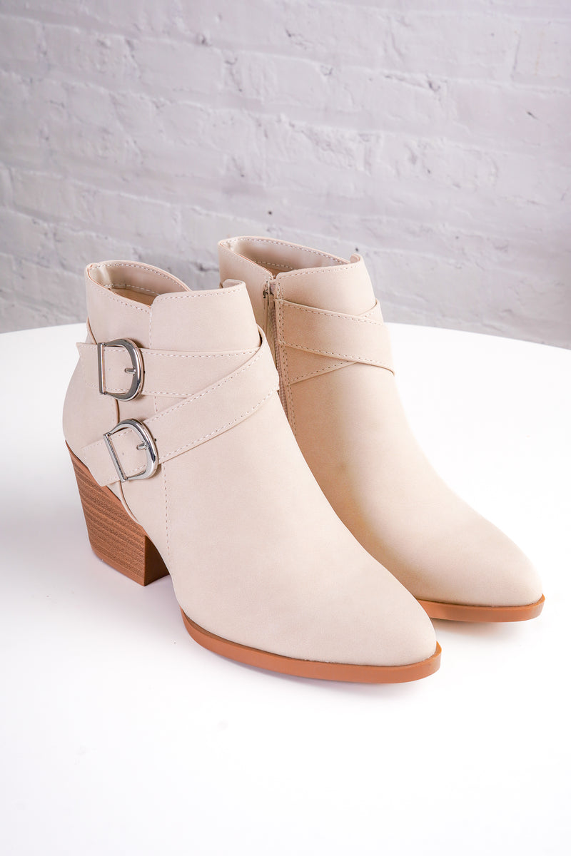beige ankle boots with wooden soles with two buckles 
