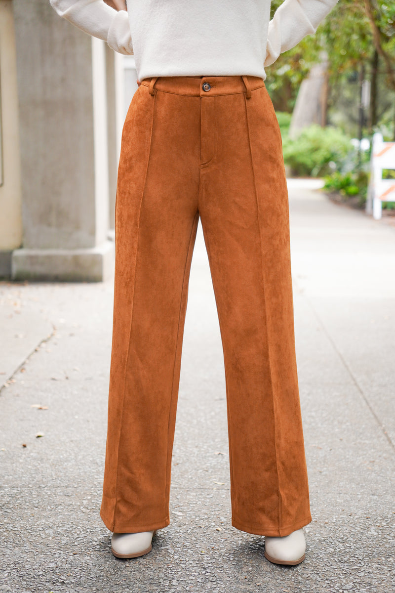 Camel colored vegan suede straight leg pants with pintuck detail, belt loops, side pockets