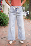 light wash denim drawstring pants 
