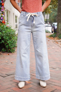 light wash denim drawstring pants 