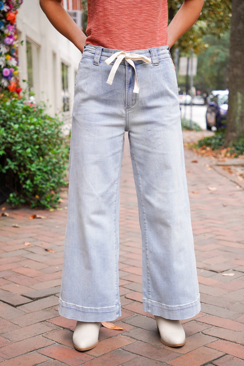 light wash denim drawstring pants 