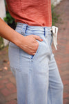 light wash denim drawstring pants 