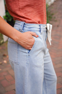 light wash denim drawstring pants 
