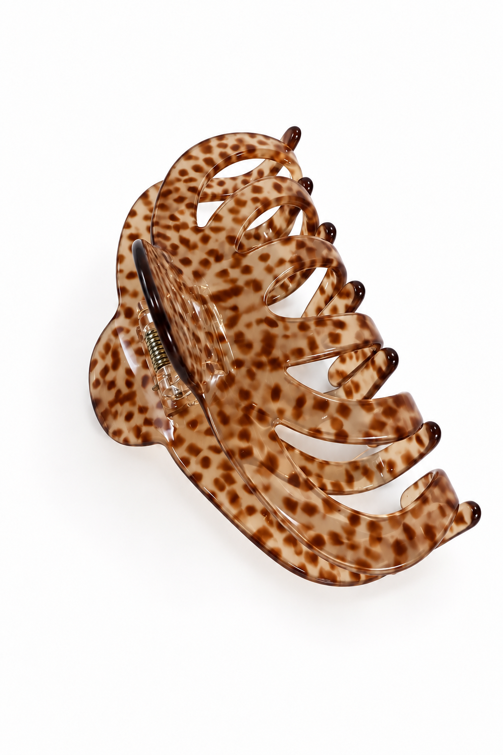 A large tortoiseshell hair claw clip with a brown and amber pattern