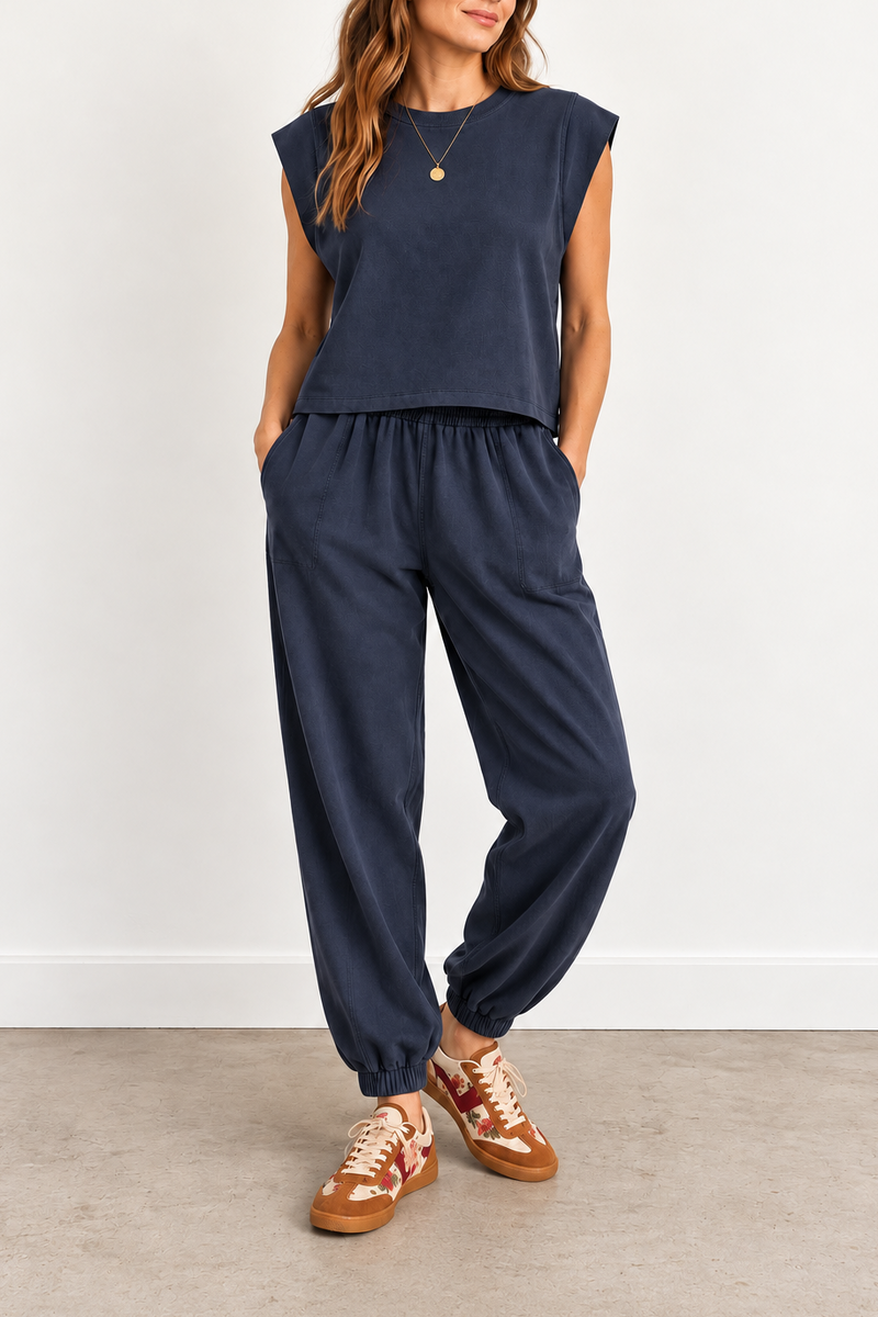 matching navy blue lounge set top consisting of a sleeveless top and jogger pants