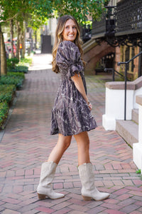 patterned dress and white boots