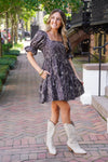 patterned dress and white boots