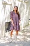 patterned short sleeve dress and white boots 