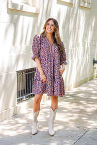 patterned short sleeve dress and white boots 