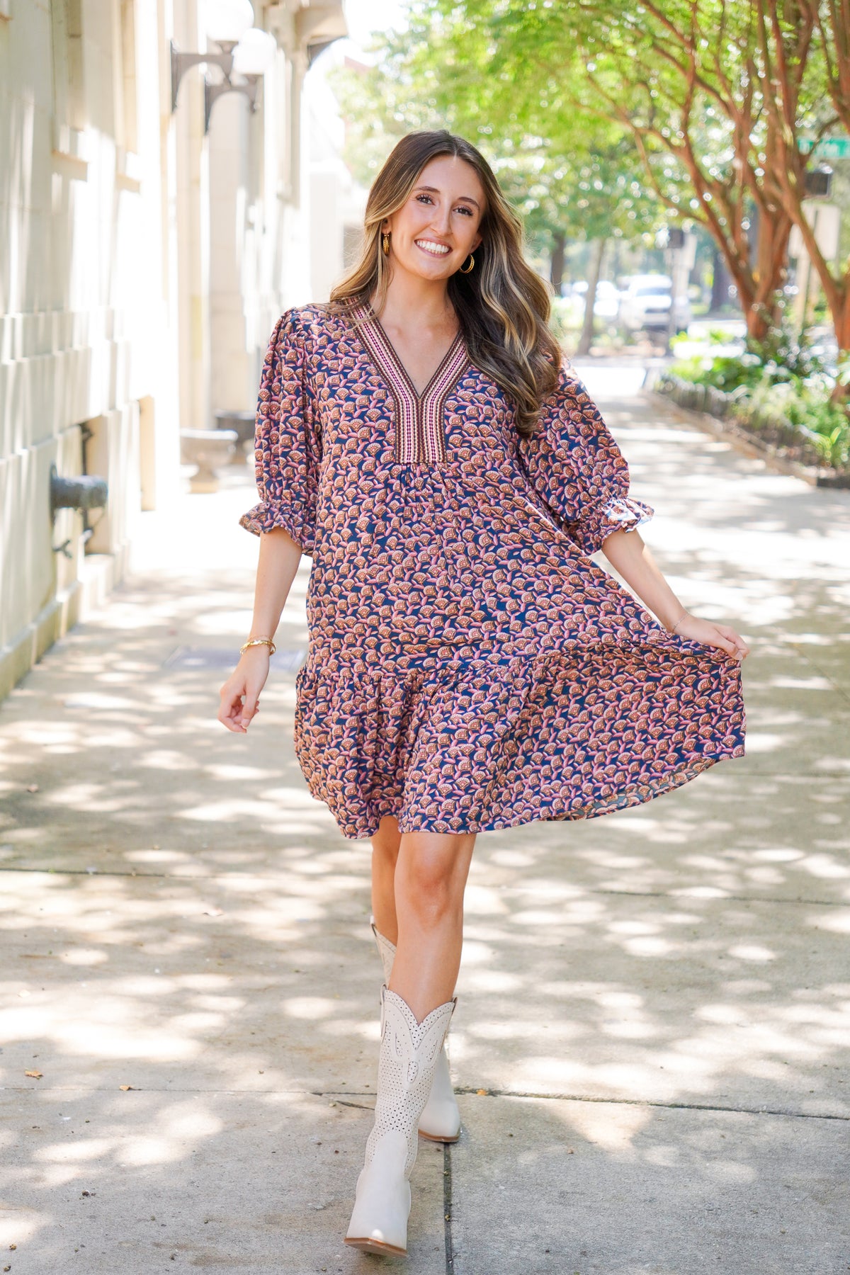 patterned short sleeve dress and white boots 