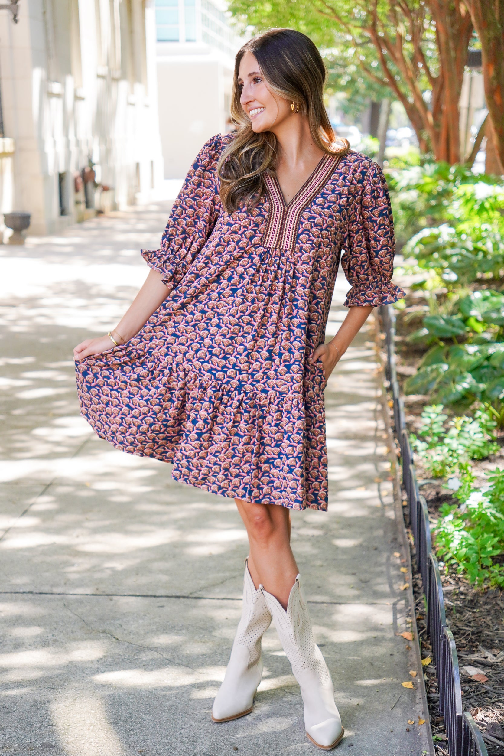 patterned short sleeve dress and white boots 