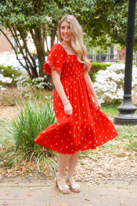 red midi dress with gold polka dots embroidered